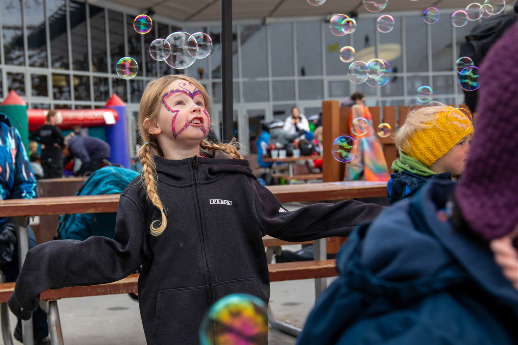 Children playing with bubbles.